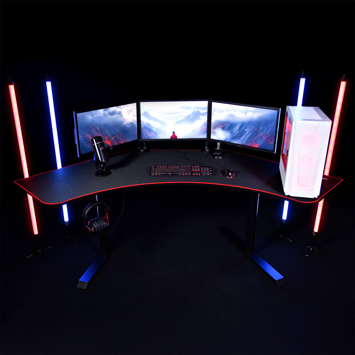 Arozzi Arena Angelo desk, triple monitors, gaming PC, custom mousepad, and LED light bars.