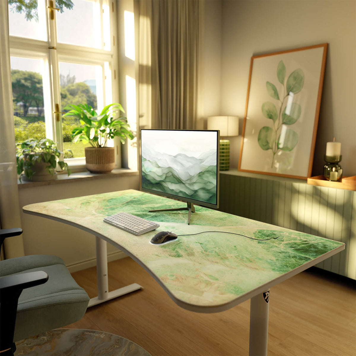 Modern desk, Arena Mousepad by Arozzi Europe, plants, art, computer, and keyboard in bright room.