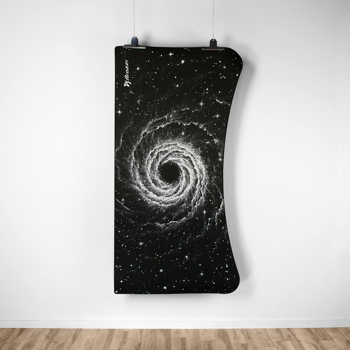 The Arena Mousepad by Arozzi Europe features a black and white galaxy spiral design.
