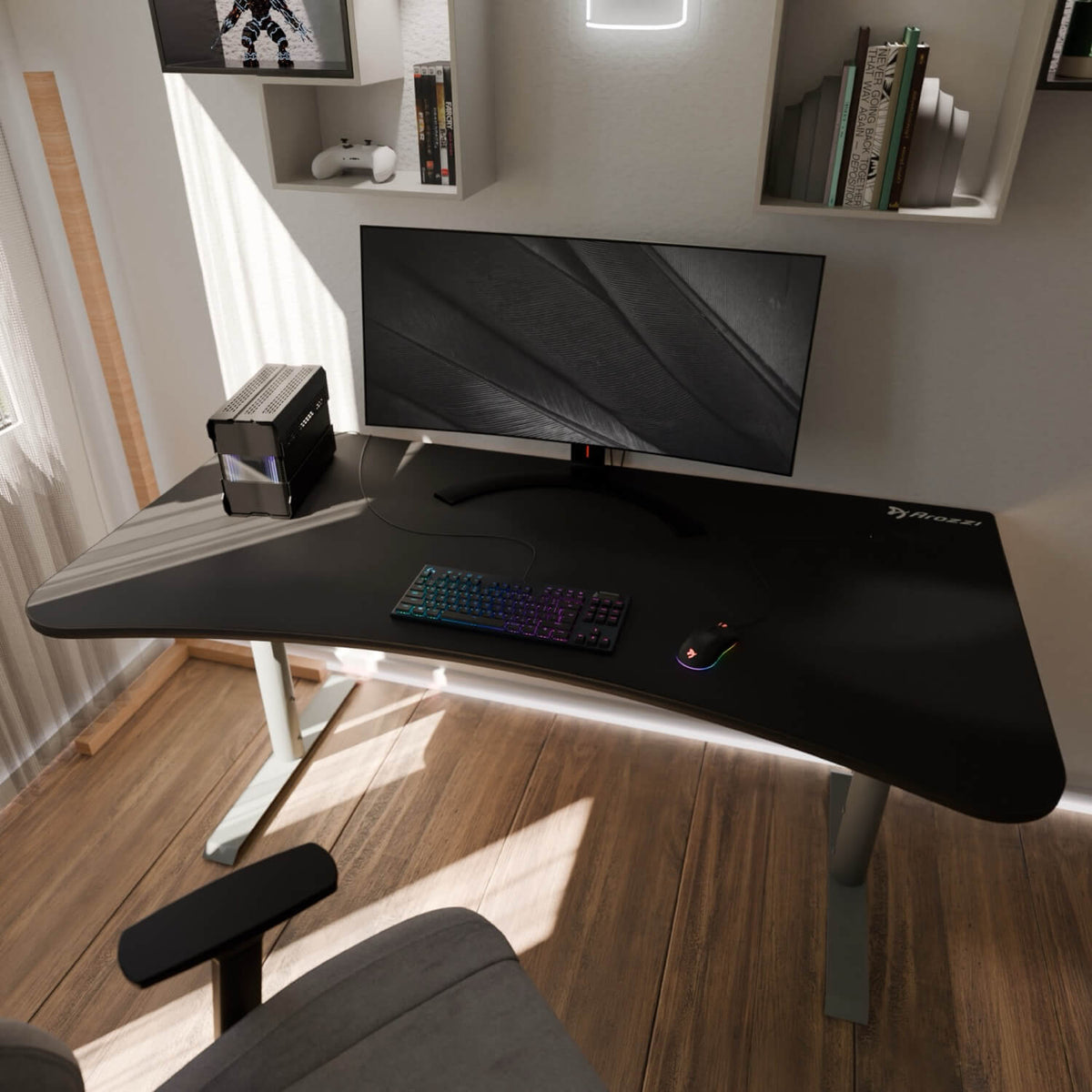 Arozzi Arena Gaming Desk setup with curved monitor, keyboard, mouse pad, and compact PC.