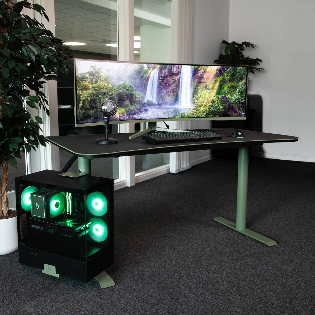 Modern desk setup with a curved monitor, keyboard, mic, glowing PC & Arozzi Arena Medium Mousepad.
