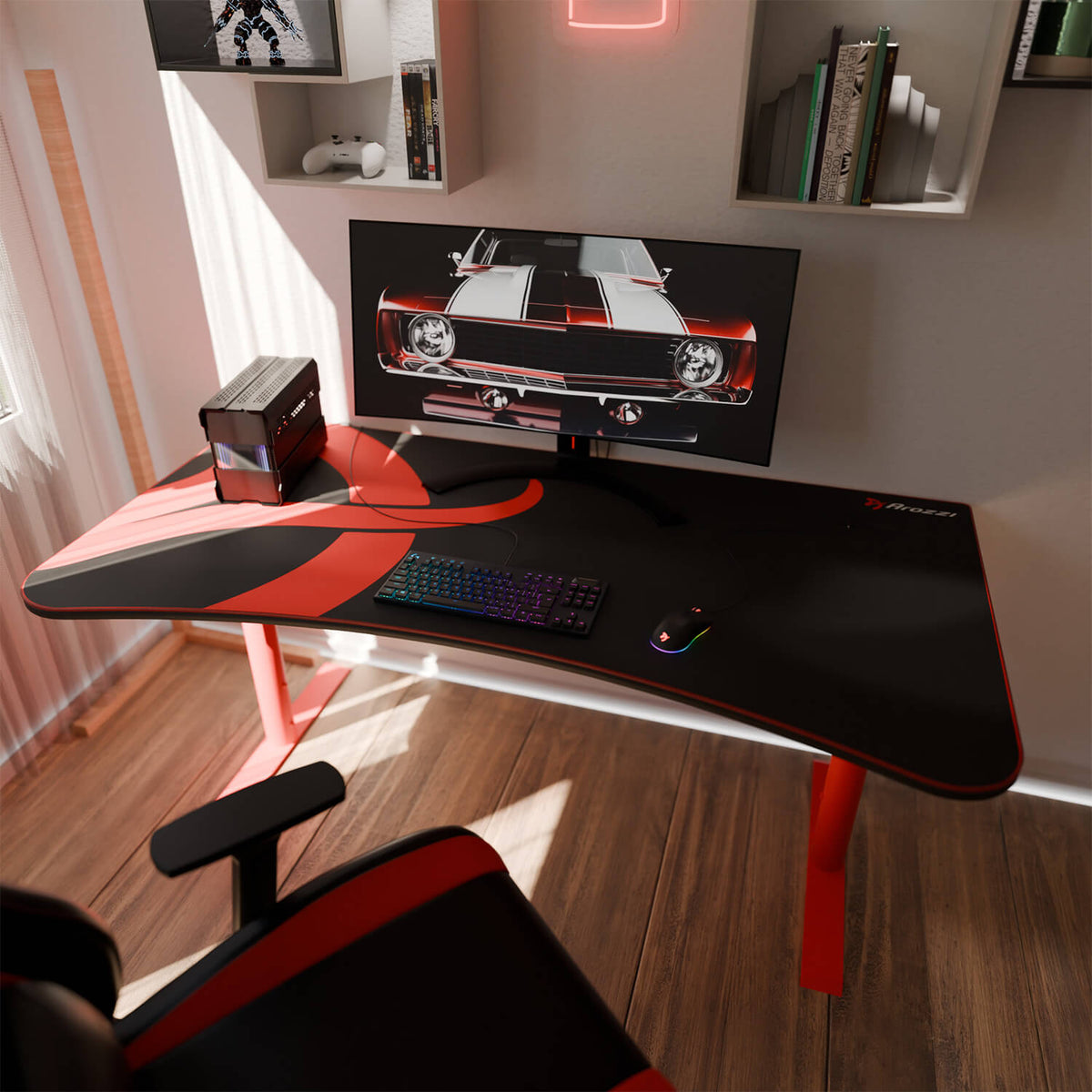 Curved desk with monitor, keyboard, Arozzi Europe Arena Mousepad, mini PC, car image on screen.