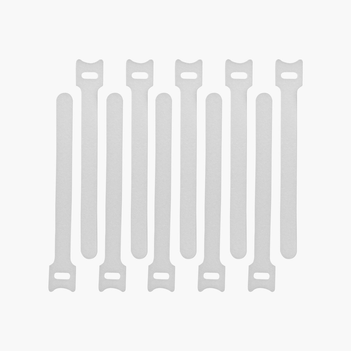 Eight white Arozzi Europe Cable Kit ties keep your workspace tidy, arranged vertically on white.