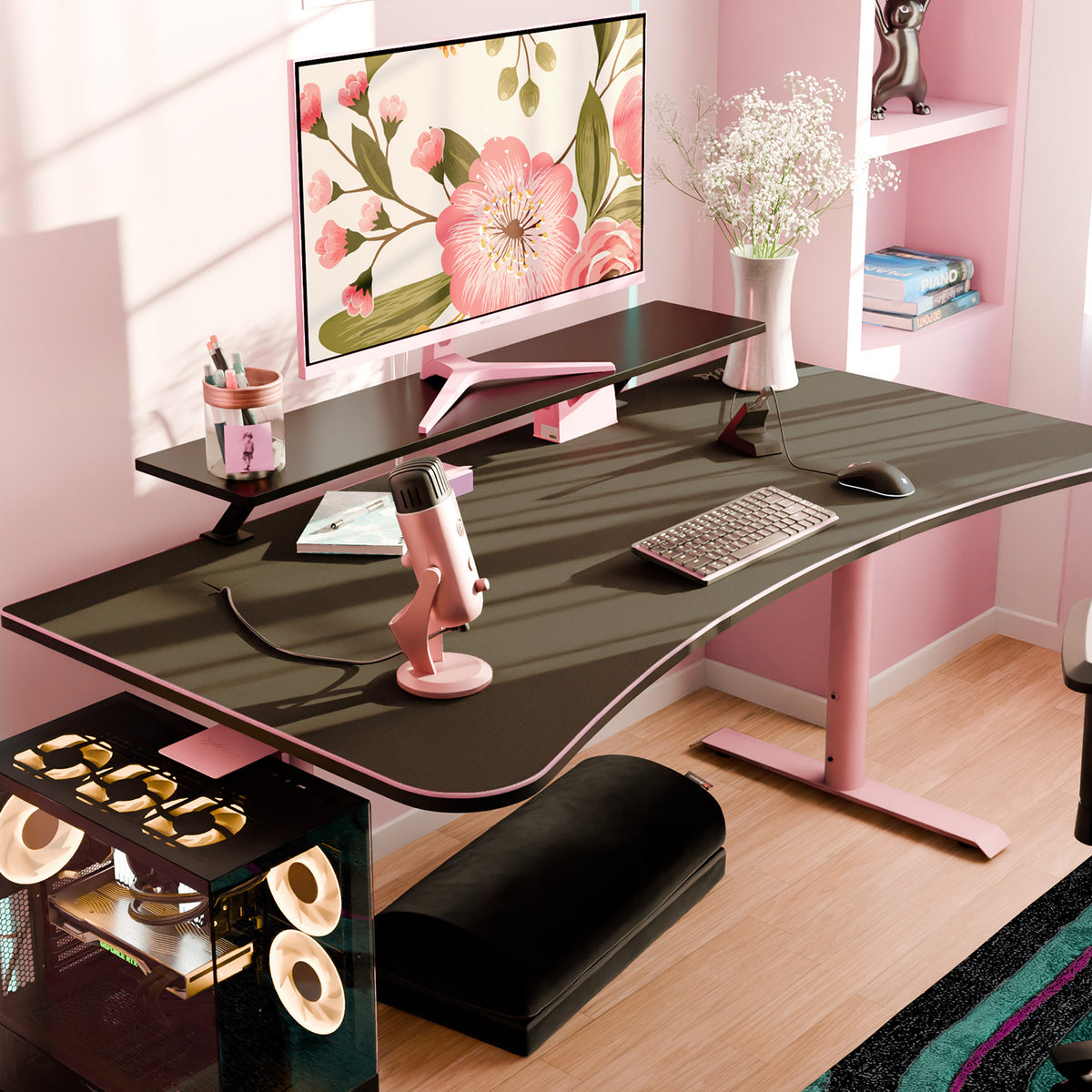Arozzi Europe Desk Riser - Large with monitor, keyboard, mouse & floral decor in sunlight.