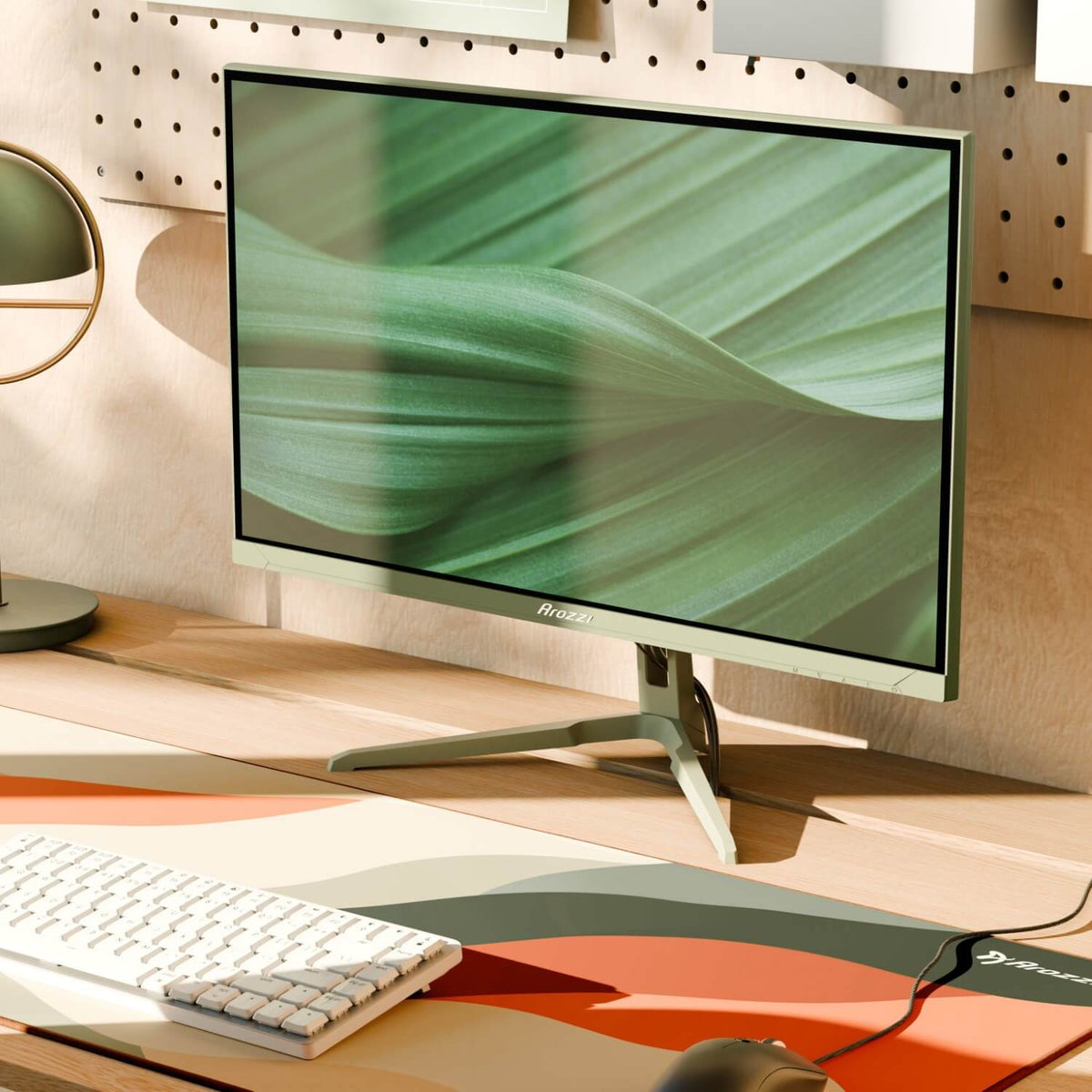 Arozzi Europe Nova 24” IPS 200Hz Gaming Monitor on desk displays a close-up green leaf.