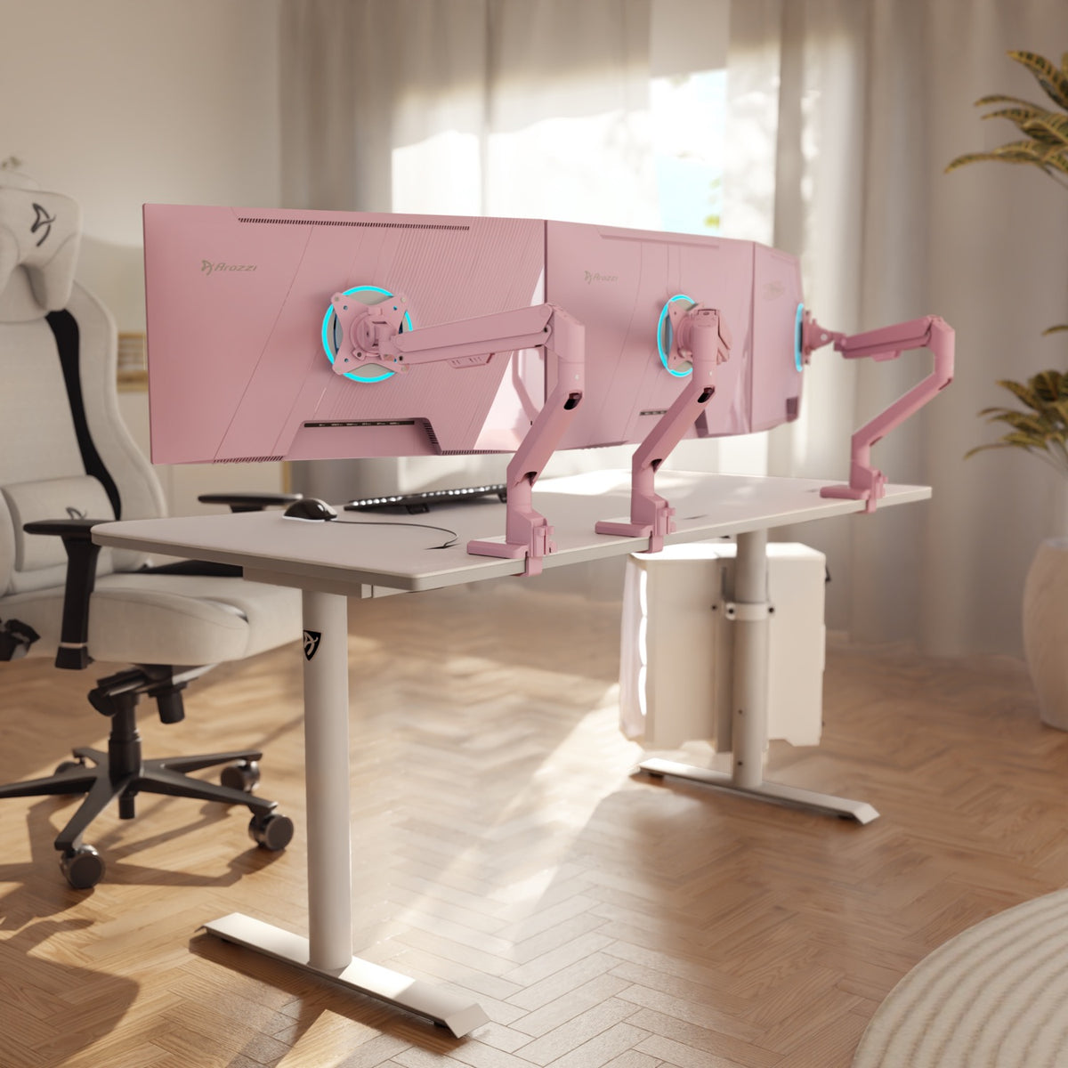 Two Arozzi Nova 27″ IPS 180Hz monitors with arms are on a white desk in a bright office.