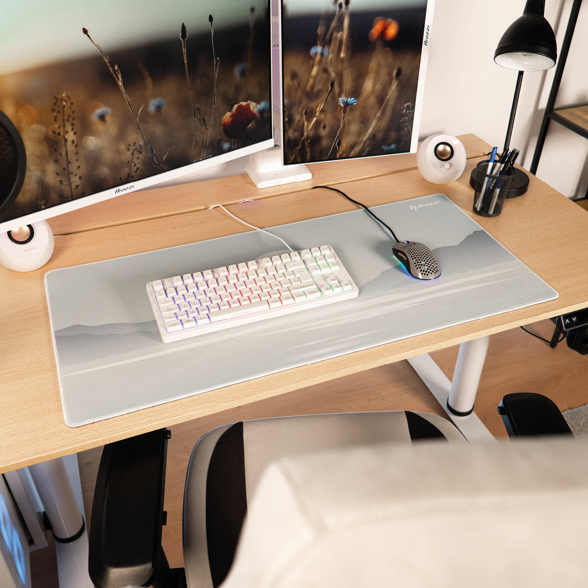 Minimalist desk with dual monitors, keyboard, mouse, and Arozzi Europe Zona Mousepad - Extra Large.
