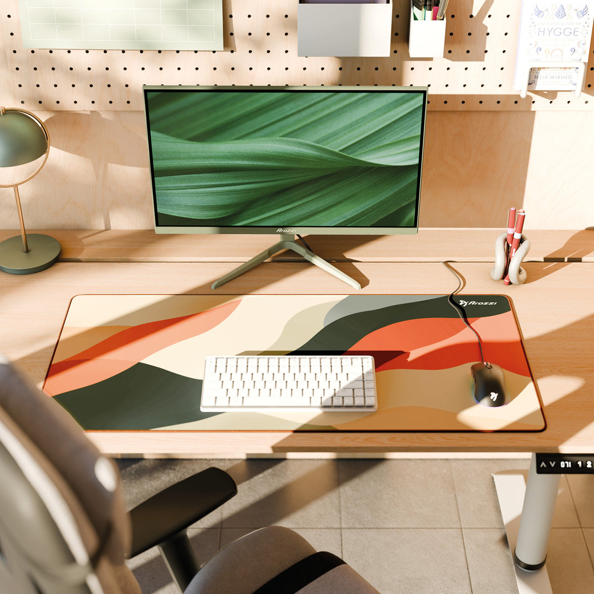 Arozzi Europe Zona Mousepad XL enhances a modern desk with monitor and keyboard in sunlight.