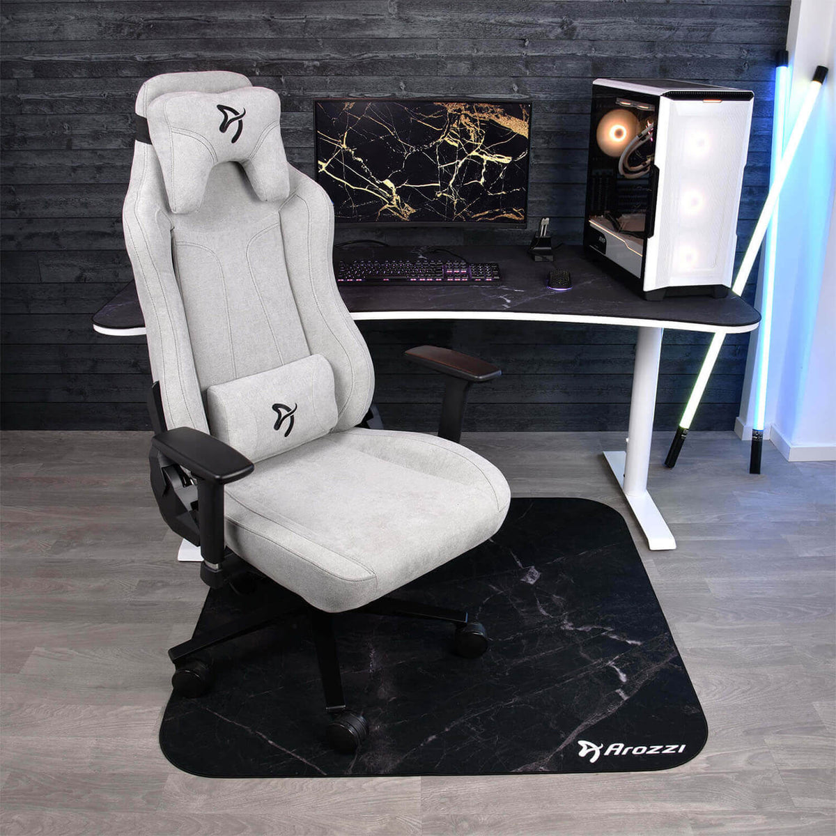 Arozzi Europe Zona Square Floor Pad under gray gaming chair, desk, and computer setup.
