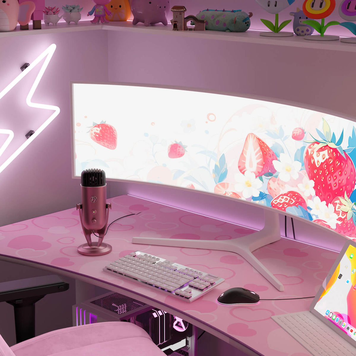 Pink gaming setup with curved monitor, Arozzi Europe Arena Mousepad, keyboard, and microphone.