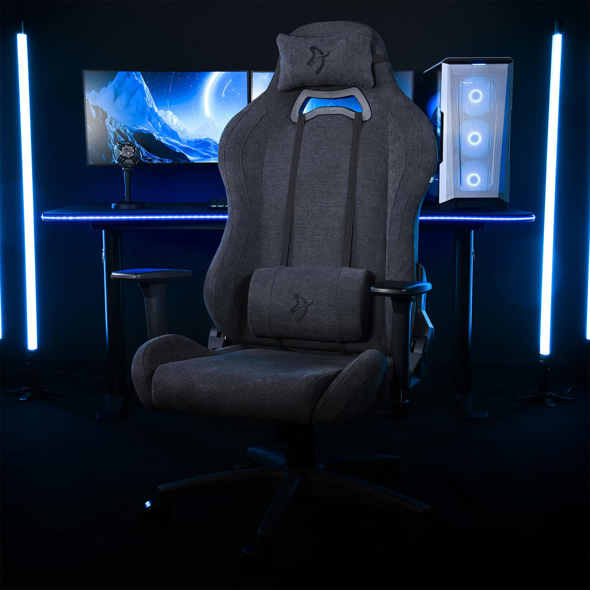 Arozzi Europe Torretta Soft Fabric chair with lumbar support in front of blue LED PC setup.