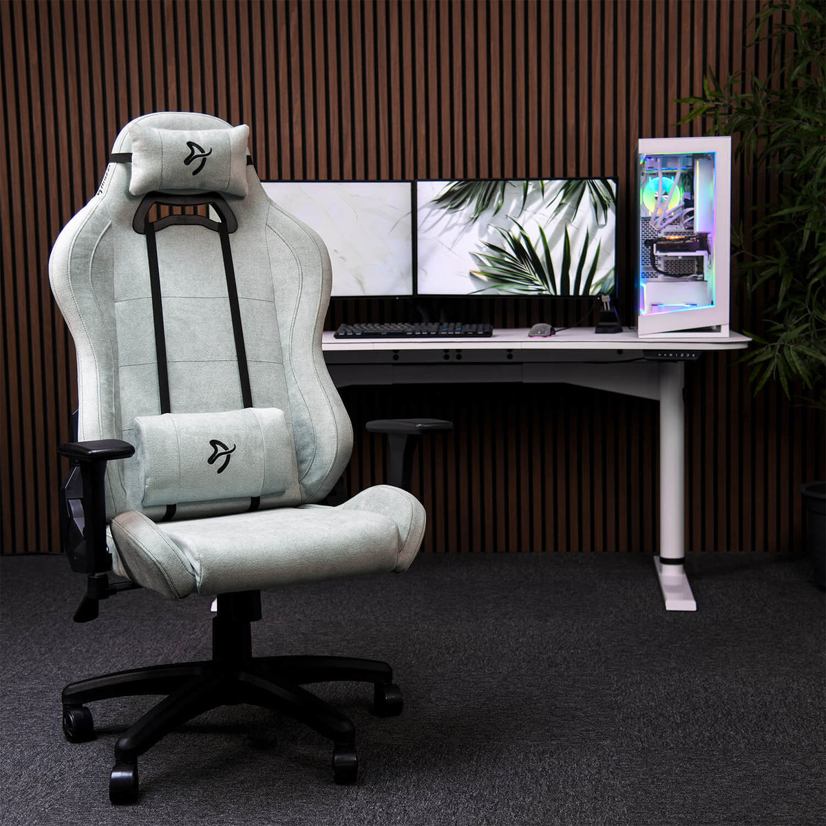 Arozzi Europe Torretta Soft Fabric chair with lumbar support at a white desk dual-monitor setup.
