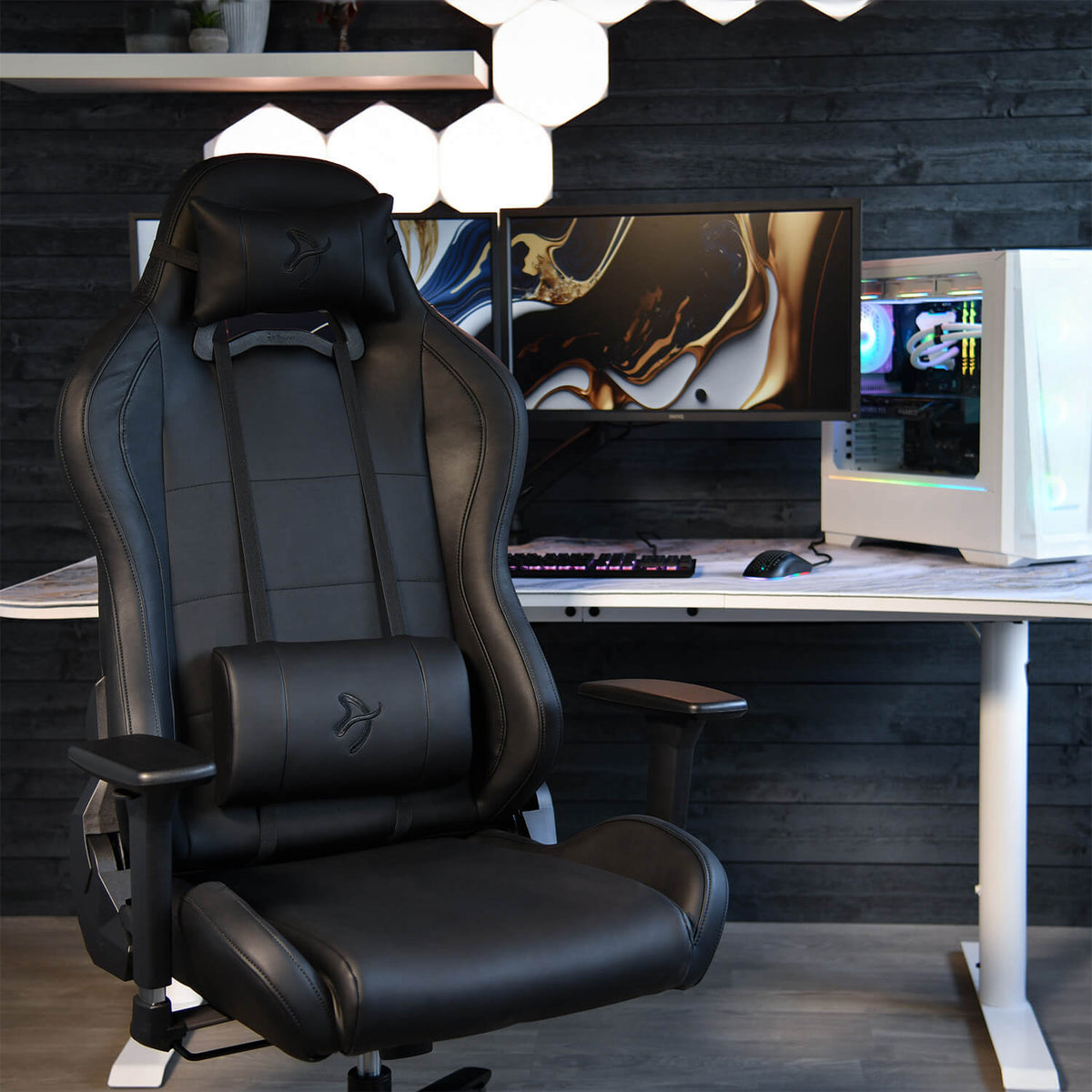 Arozzi Europe Torretta SoftPU ergonomic chair with lumbar support at desk with monitors and PC.