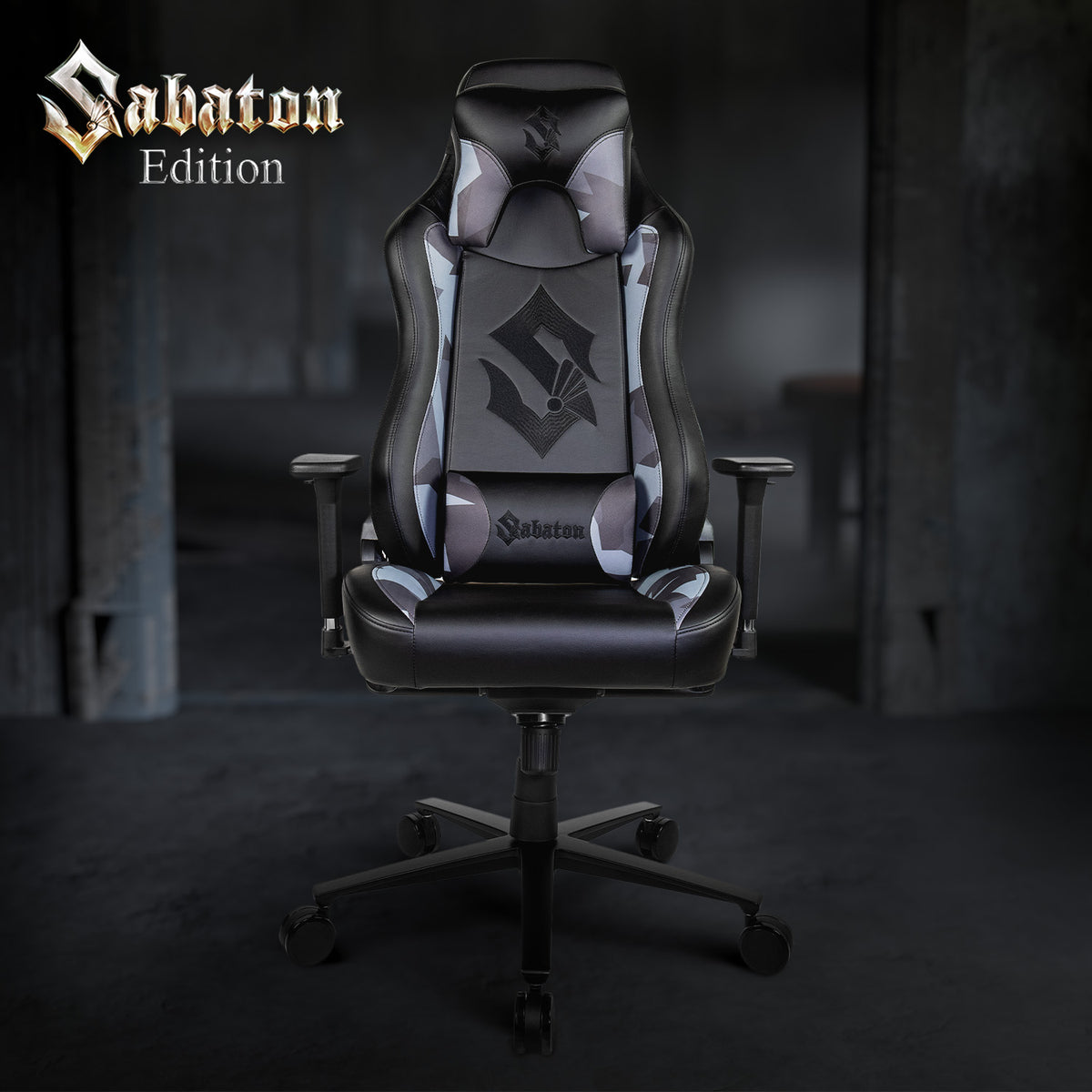 Arozzi Vernazza Sabaton Edition gaming chair with headrest and armrests in a dimly lit room.