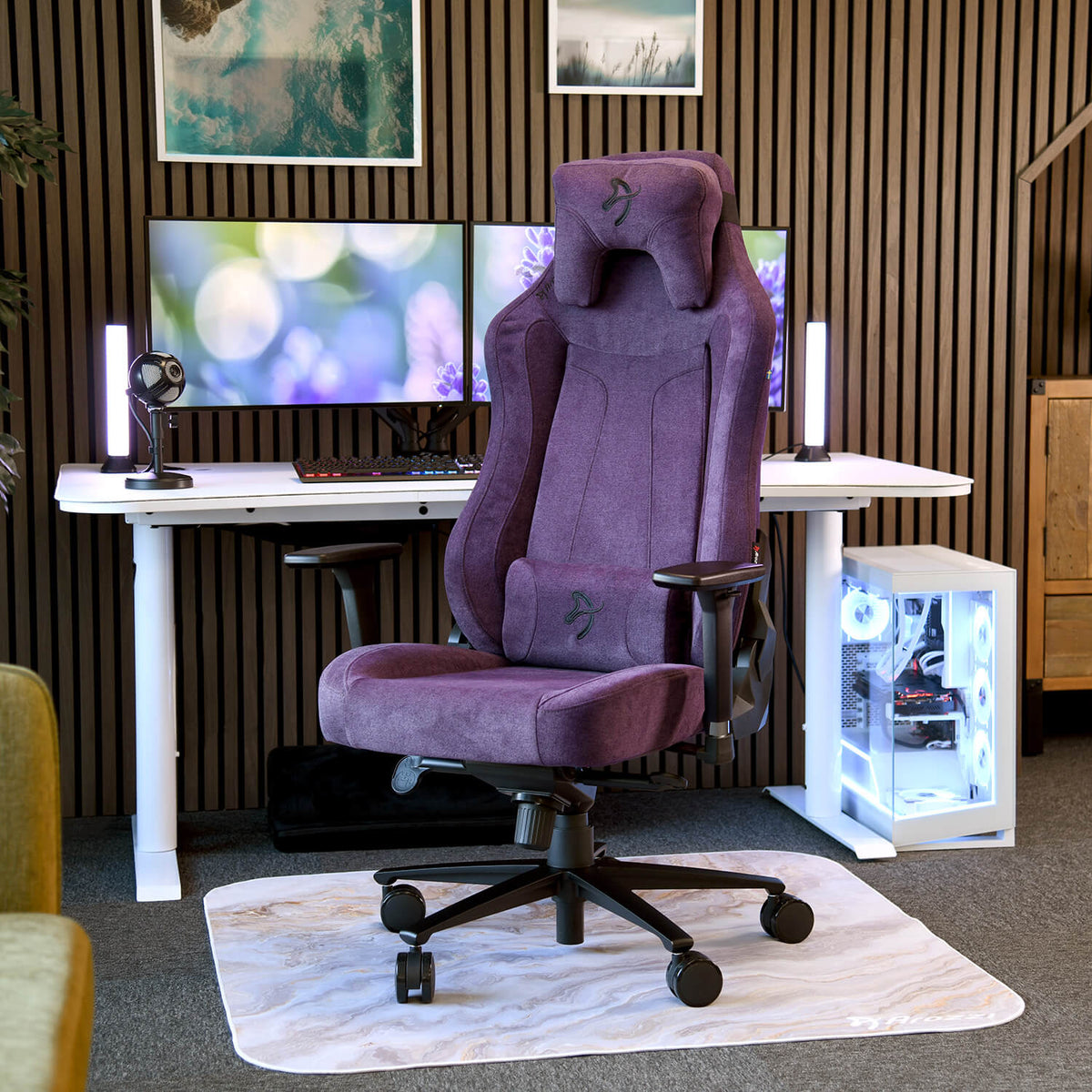Arozzi Europe Vernazza Soft Fabric chair in front of a white desk with monitors and gaming PC.