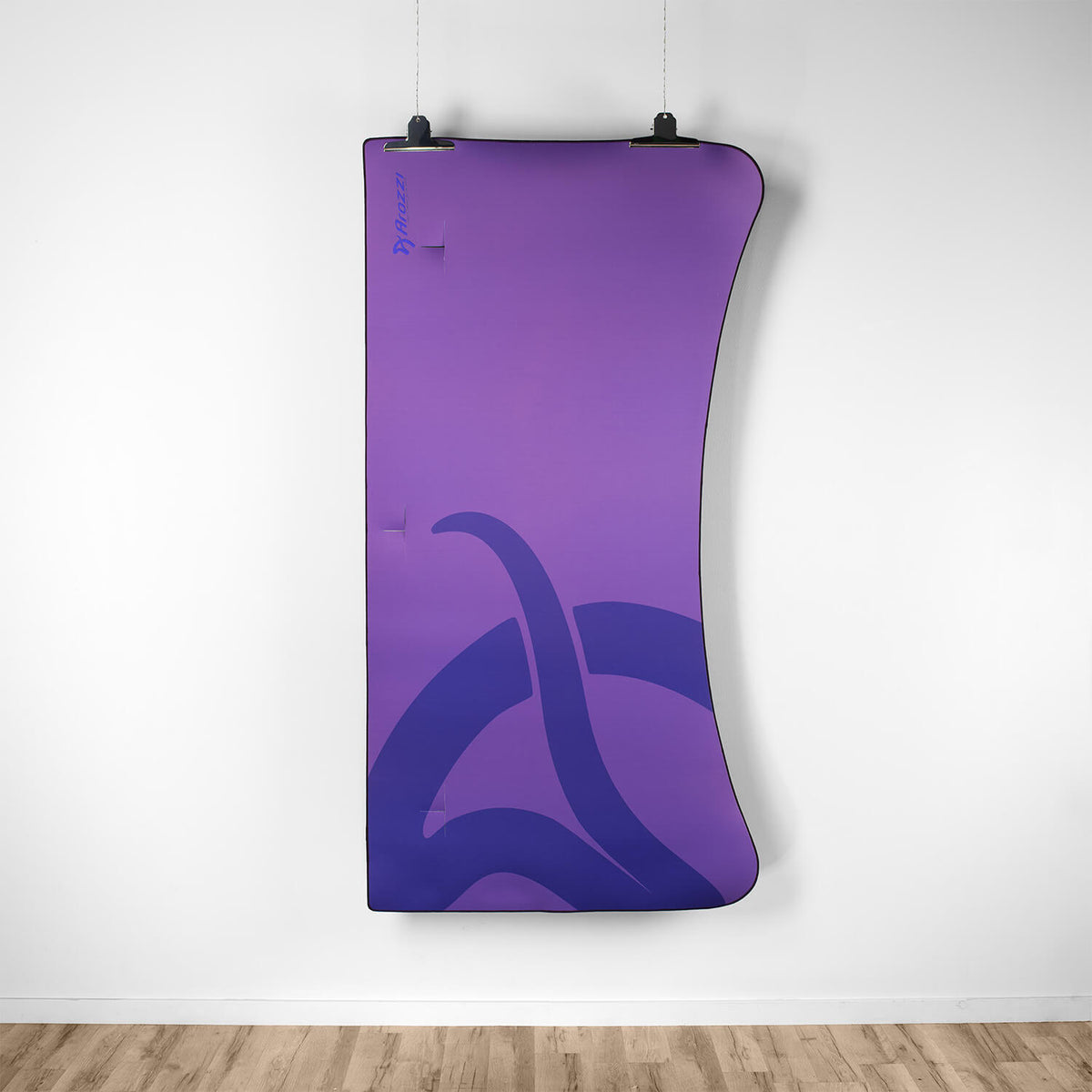 Arozzi Europe Arena Mousepad: purple, curved, abstract blue design, shown on a white wall.