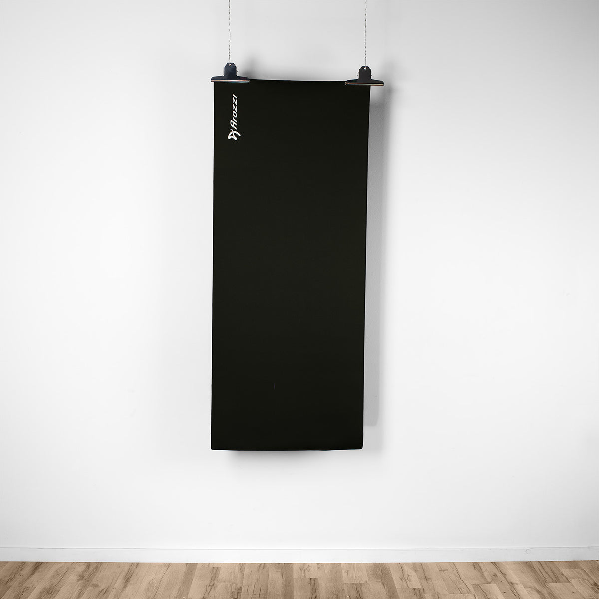 The Arena Nordico Mousepad by Arozzi Europe hangs on a white wall above a light wood floor.