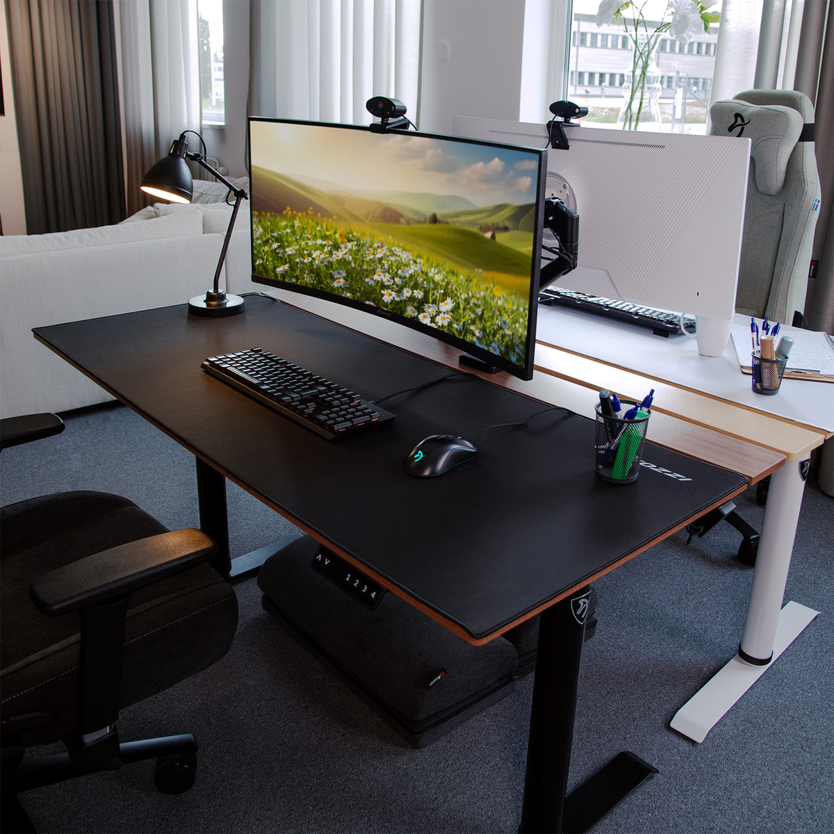 Bright room desk with Arena Nordico Mousepad, curved monitor & keyboard by Arozzi Europe.