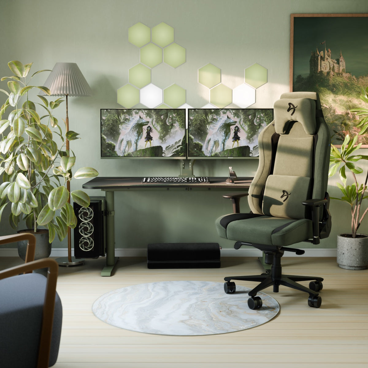 Modern gaming desk with dual monitors, green chair, plants, and an Arozzi Europe Arena Mousepad.