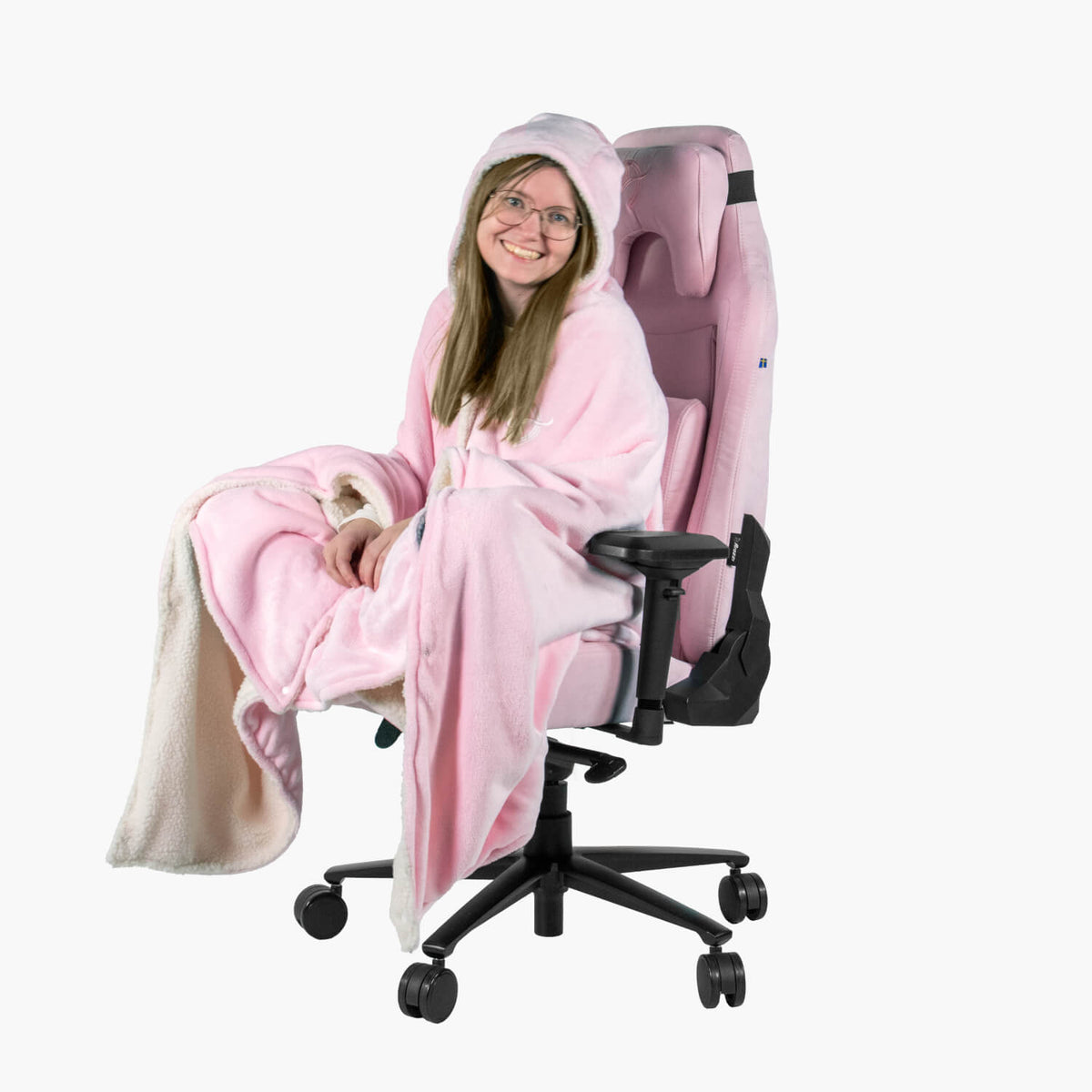 Smiling person in a pink Arozzi Europe Chair Blanket sits facing forward in a pink gaming chair.