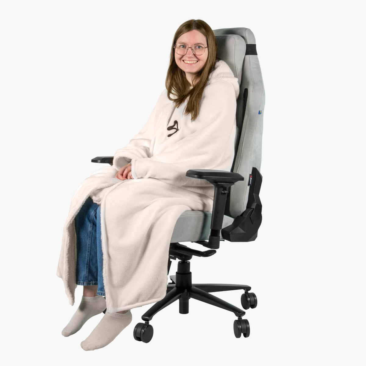 Woman in a white Arozzi Europe Chair Blanket sits smiling on a gray office chair.