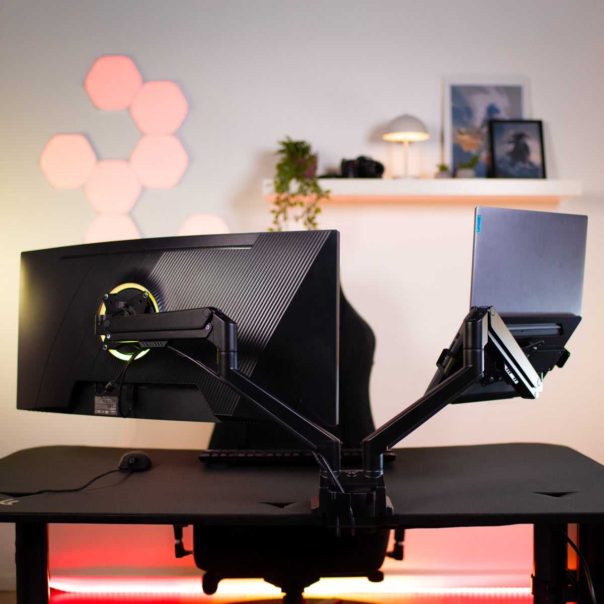 Arozzi Europe Alzare Neo Duo offers gas spring arms for large screens and laptops on modern desks.