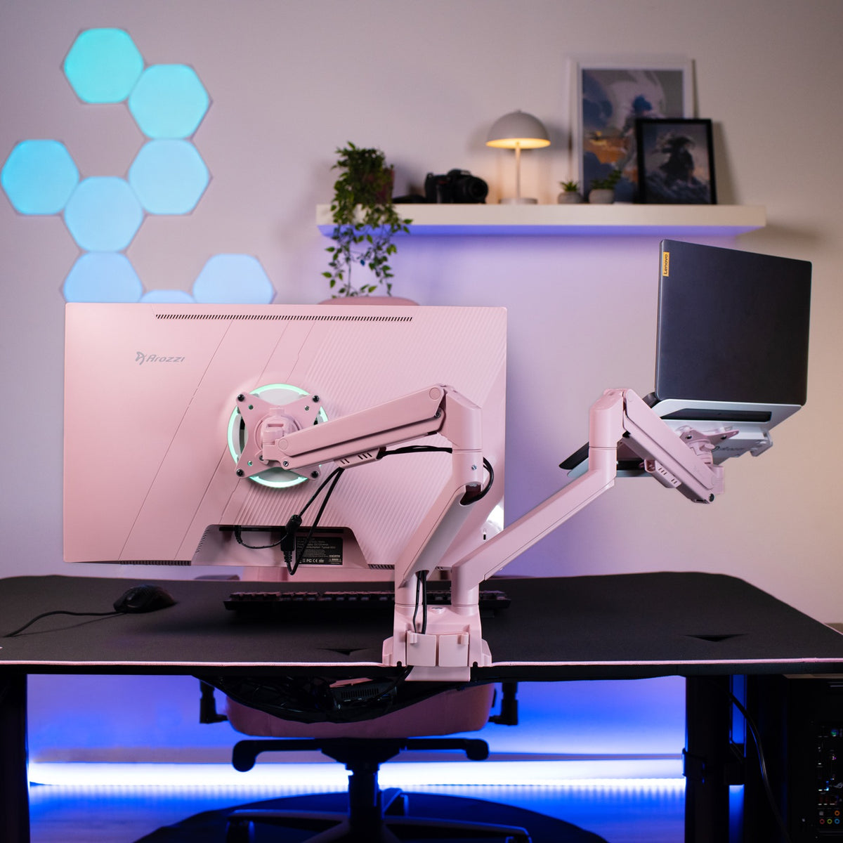 Alzare Neo Duo by Arozzi: full-metal dual monitor arm, pink accents, LED wall lights.