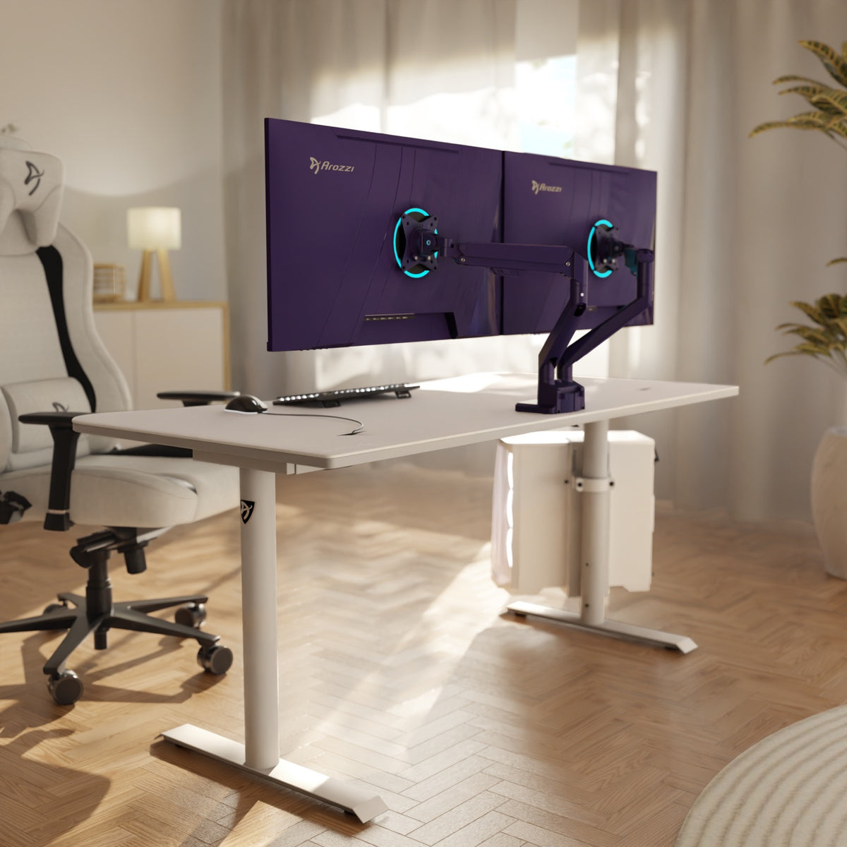 White desk, white chair, two monitors on Arozzi Alzare Neo Duo arms in a modern room.