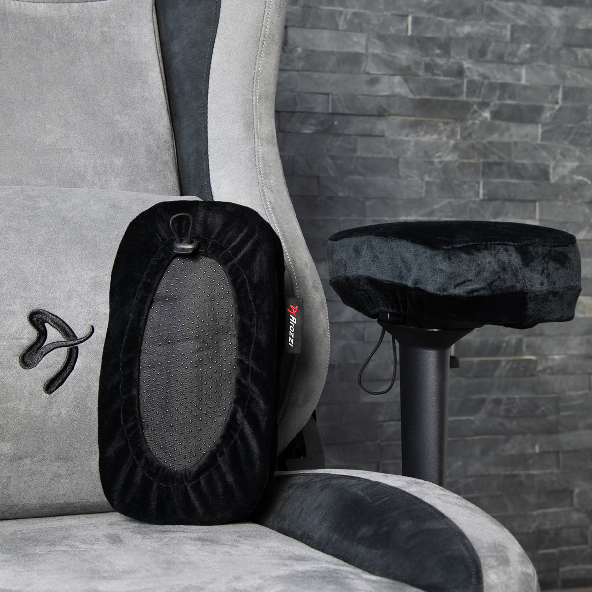 Arozzi Europe Memory Foam Armrest Pads on a grey gaming chair with black velvet cushion.