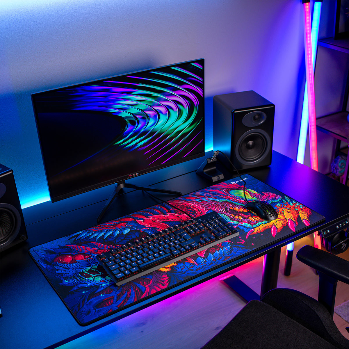 Arozzi Nova 27″ IPS 260Hz monitor, speakers, keyboard, and a vibrant mouse pad gaming setup.