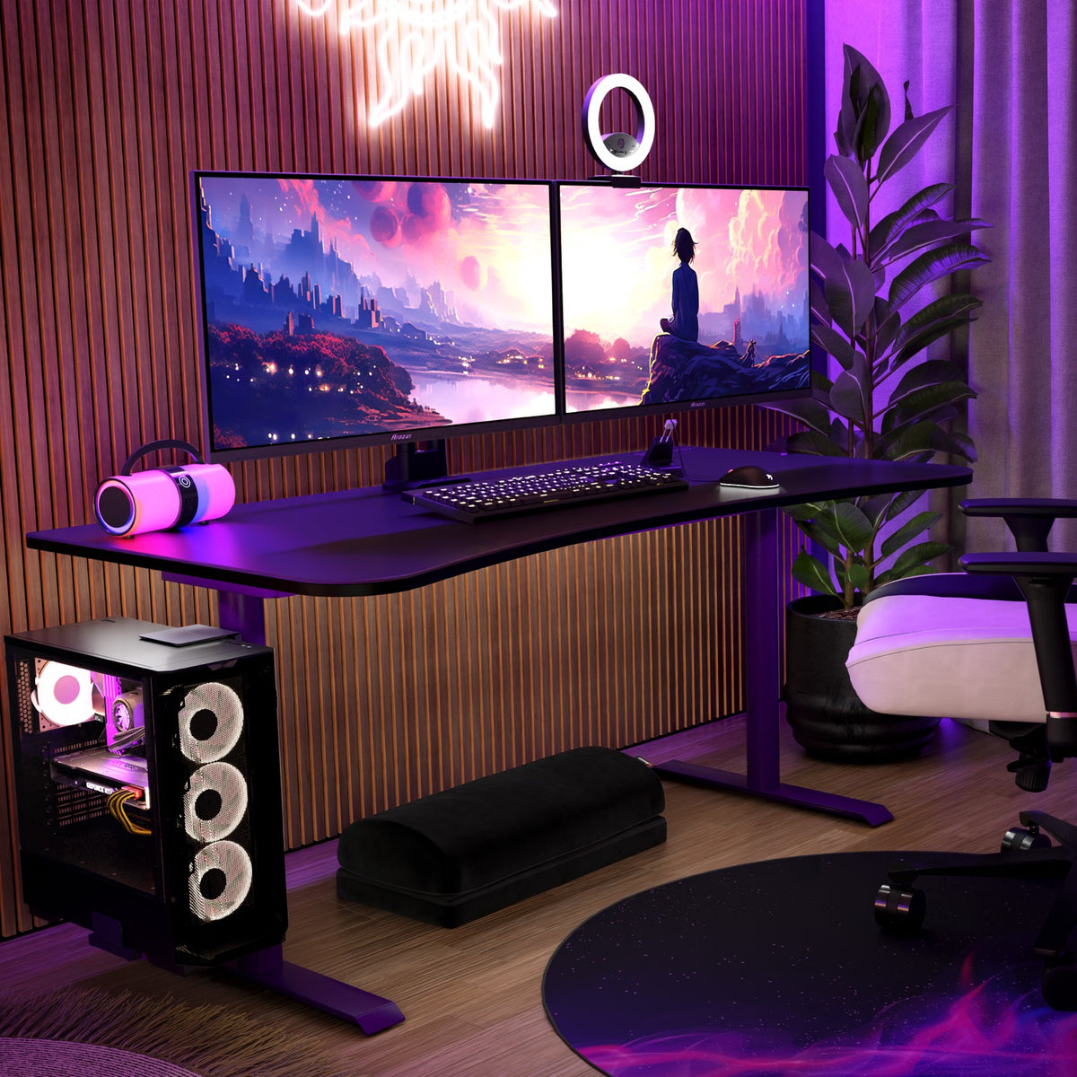 Modern setup with dual Arozzi Nova 32″ IPS 180Hz monitors, RGB lights, PC, and plant.