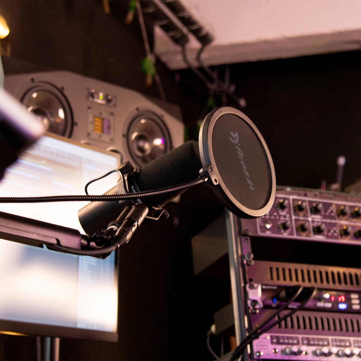 Arozzi Europe Pop Filter in studio recording setup.