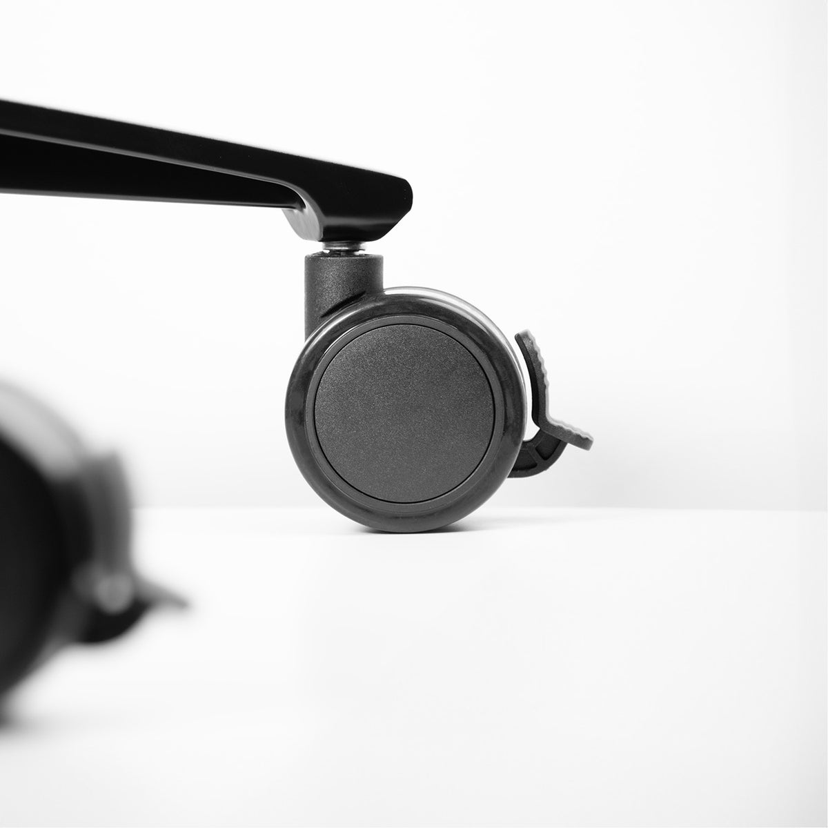 Close-up of an XL Wheels - Lockable caster by Arozzi Europe on a white background.