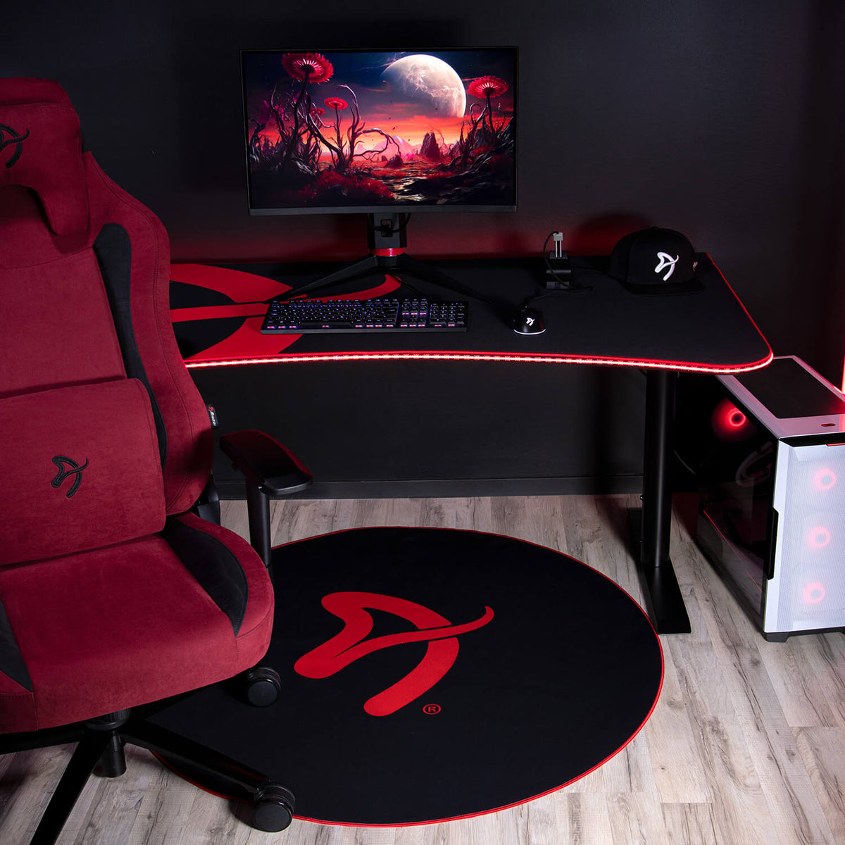 Arozzi Europe Zona round floor pad completes your red and black gamer setup with style.