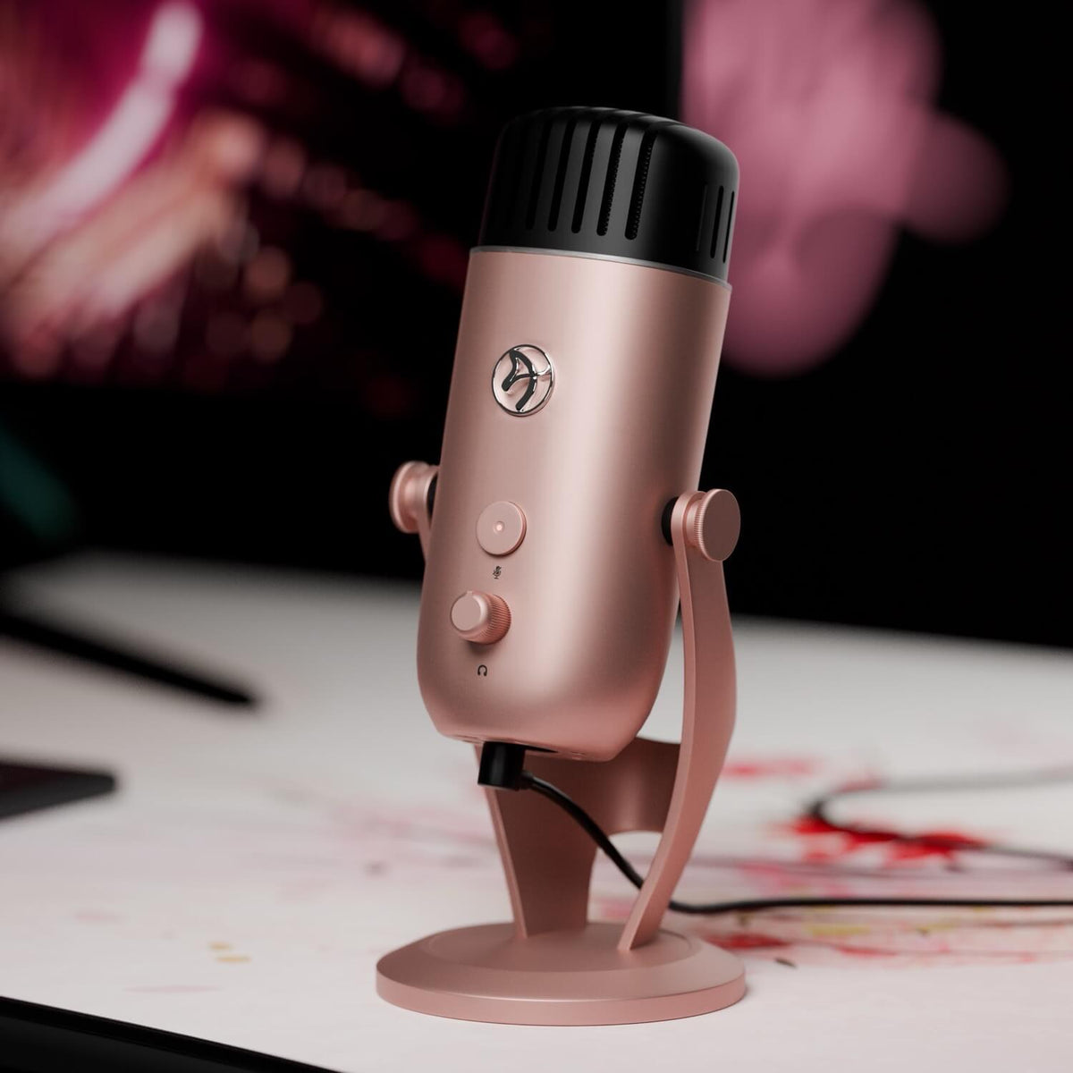 Arozzi Europe Colonna Microphone in rose gold, ideal for streaming, on a white desk stand.