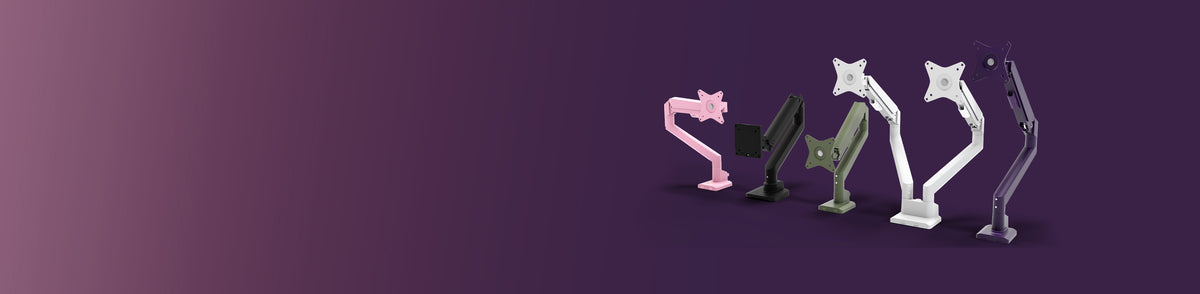Four monitor arms in pink, black, gray, and white on a purple gradient background.