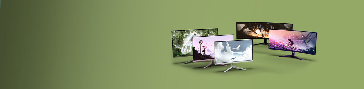 Five computer monitors displaying various colorful images on a green background.