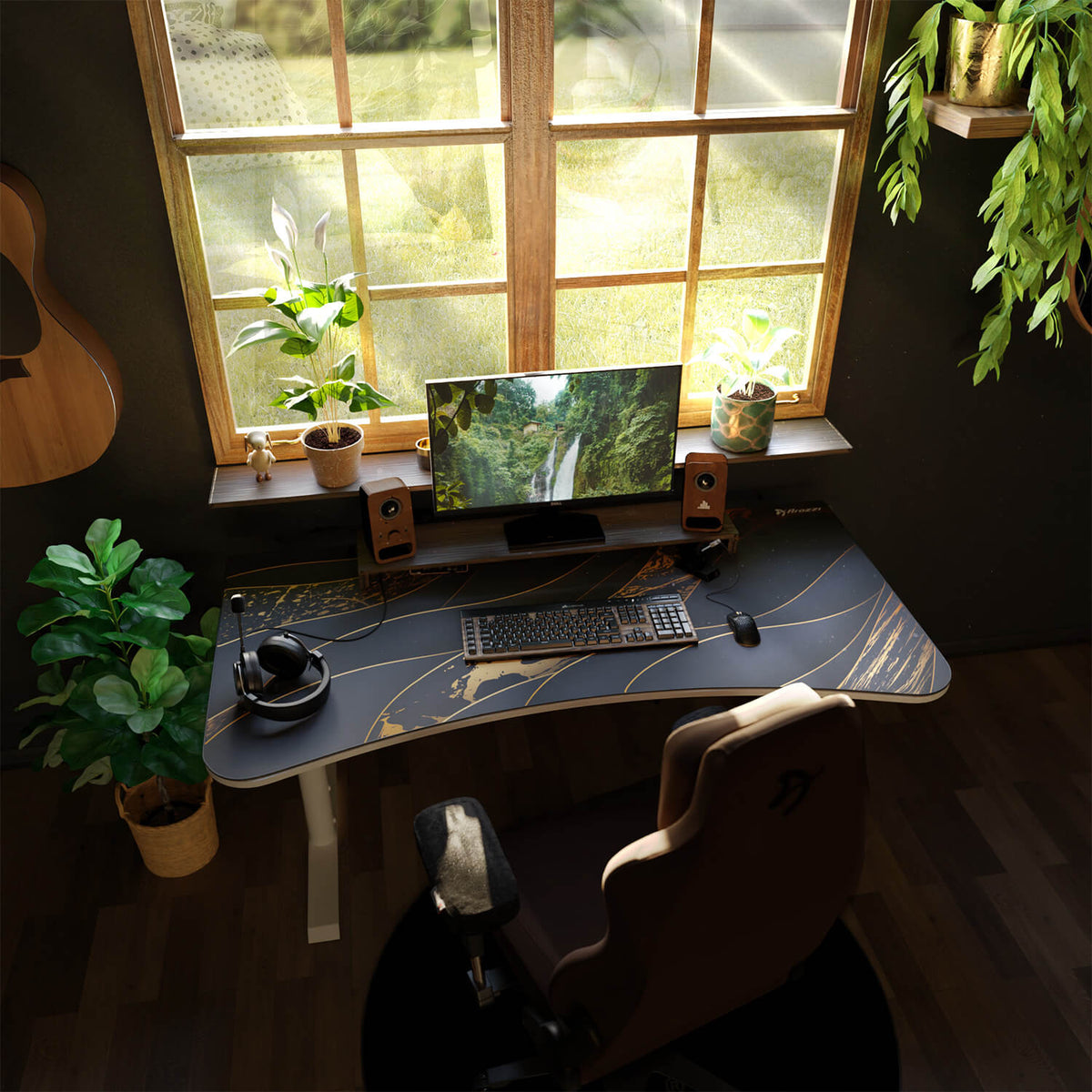 A neat desk with a computer, plants, and an Arozzi Europe Arena Mousepad in sunlight by the window.