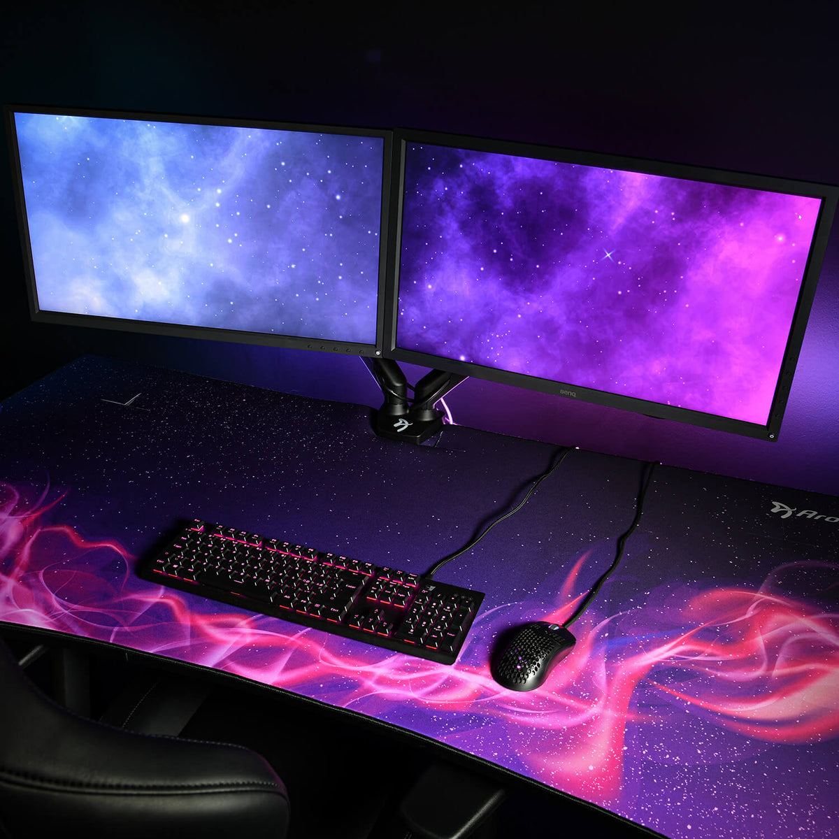 Dual monitors, RGB keyboard/mouse, and an Arozzi Arena Gaming Desk with cable management.
