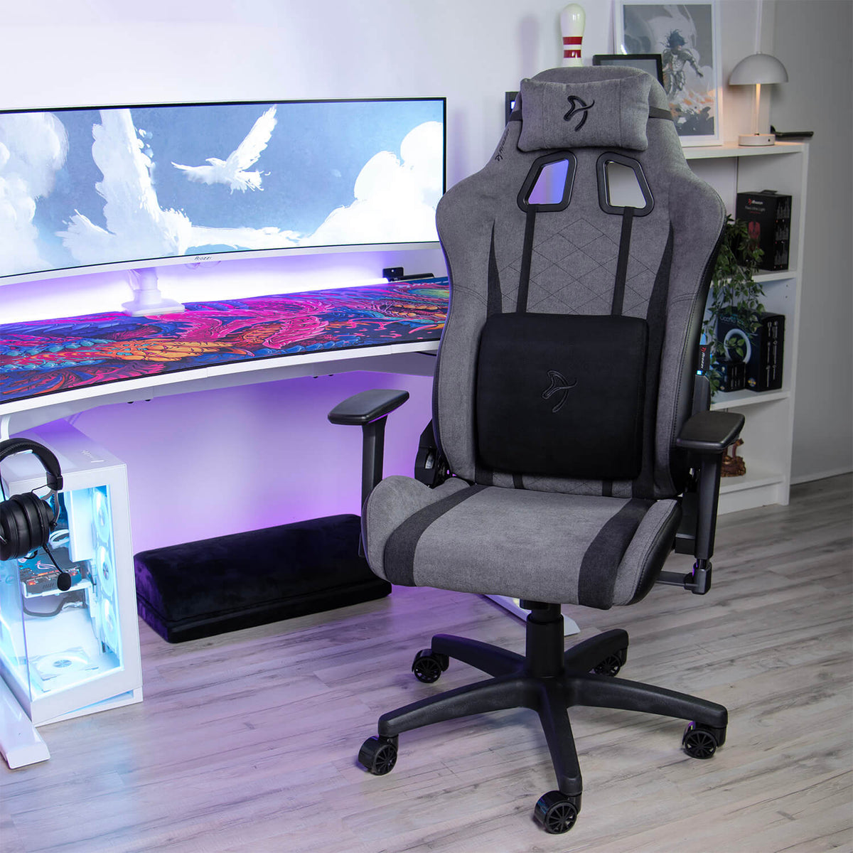 Gray gaming chair with Arozzi Europe Lumbar Support Pillow Velvet Black for extra comfort.