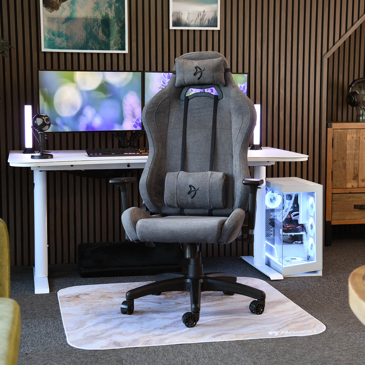 Arozzi Europe Torretta Soft Fabric chair with lumbar support sits in a modern dual-monitor setup.