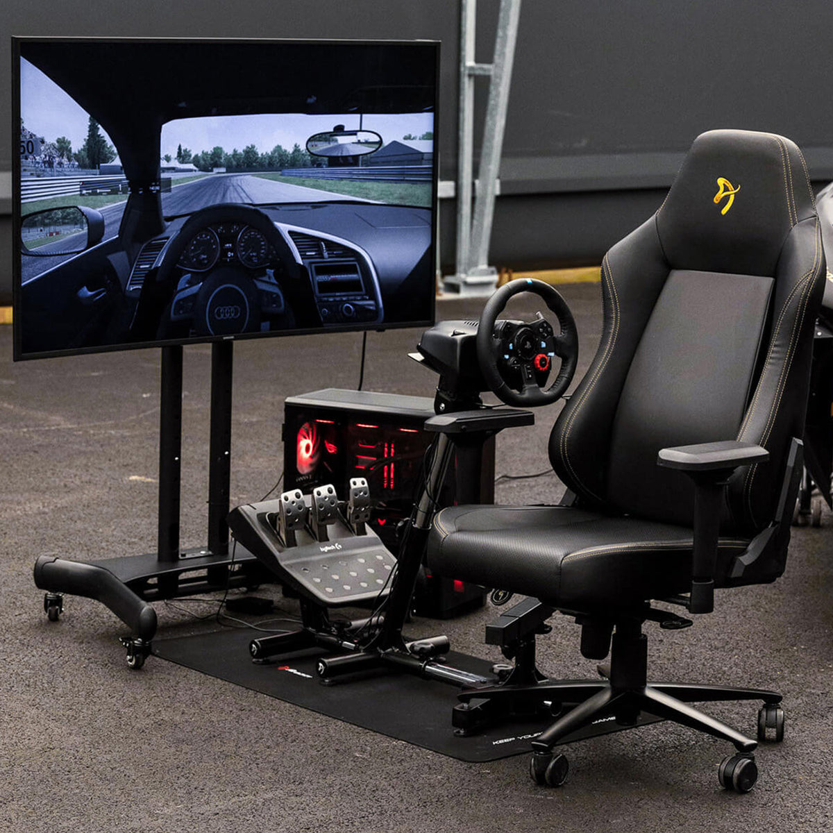 Arozzi Europe Velocità Racing Simulator Stand for screen, wheel, pedals, and chair setup.