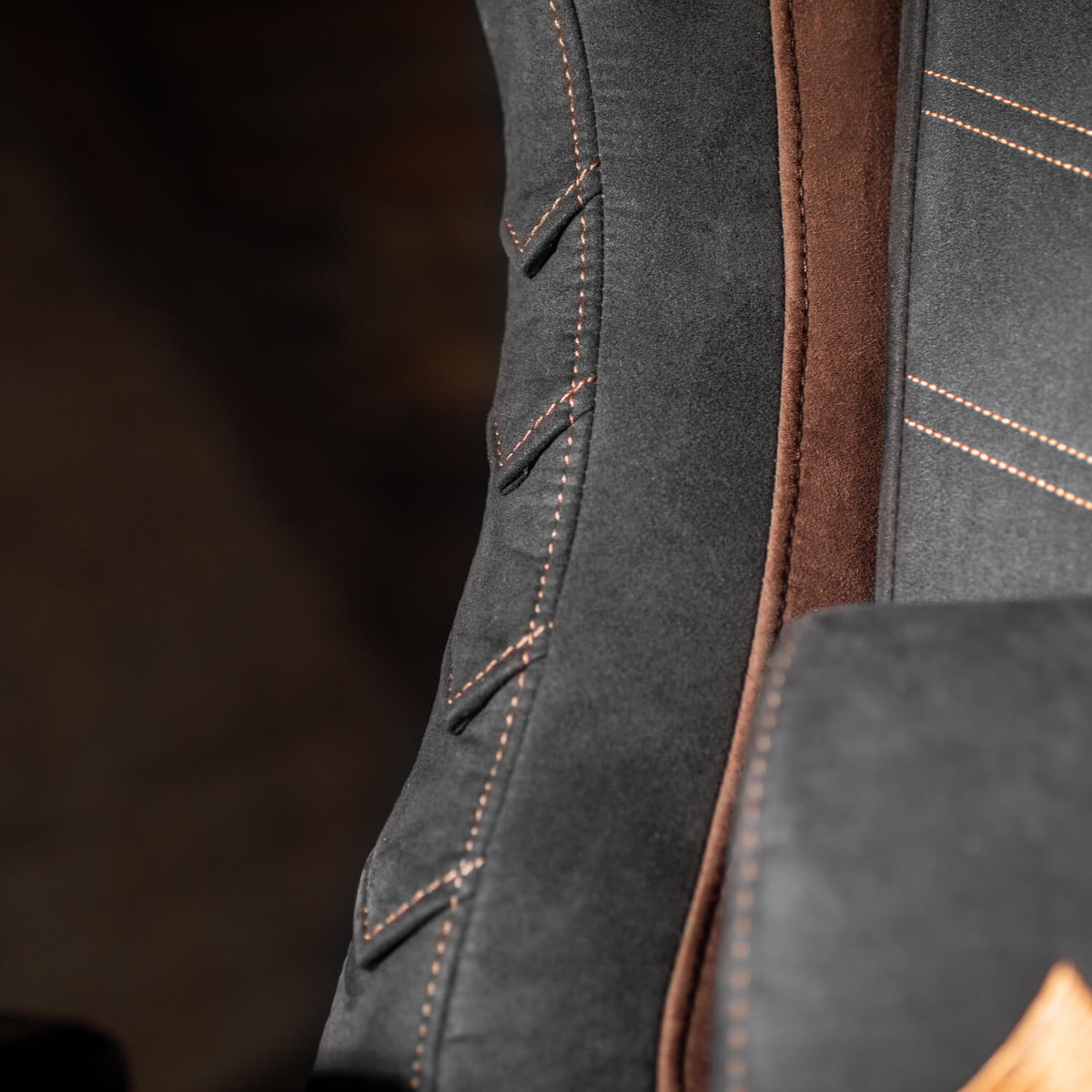 Stitched seams on supersoft upholstery of Arozzi Vernazza Sabaton Legends Edition chair.