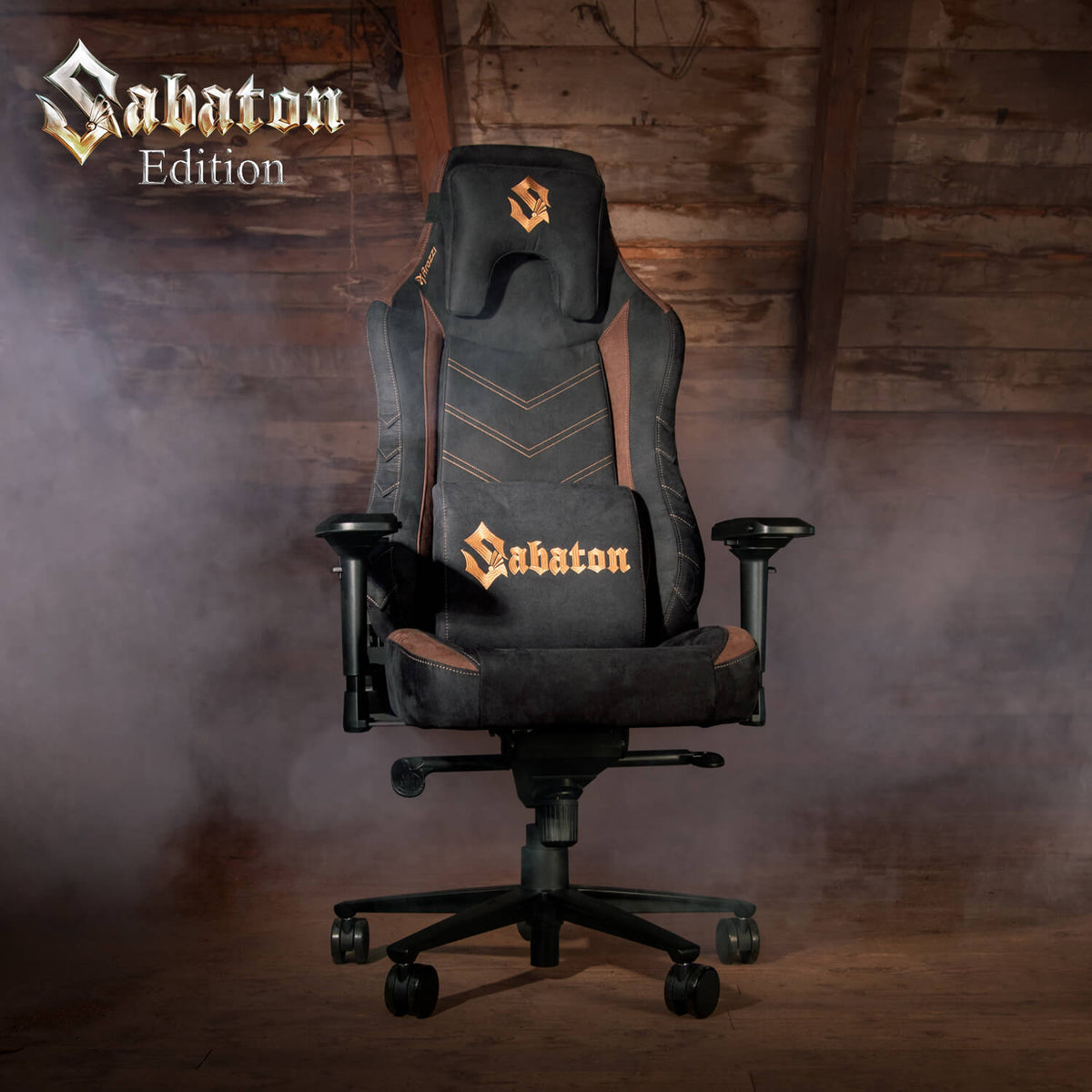 Arozzi Vernazza Supersoft Sabaton Legends glows gold & black in smoky attic with wood ceiling.
