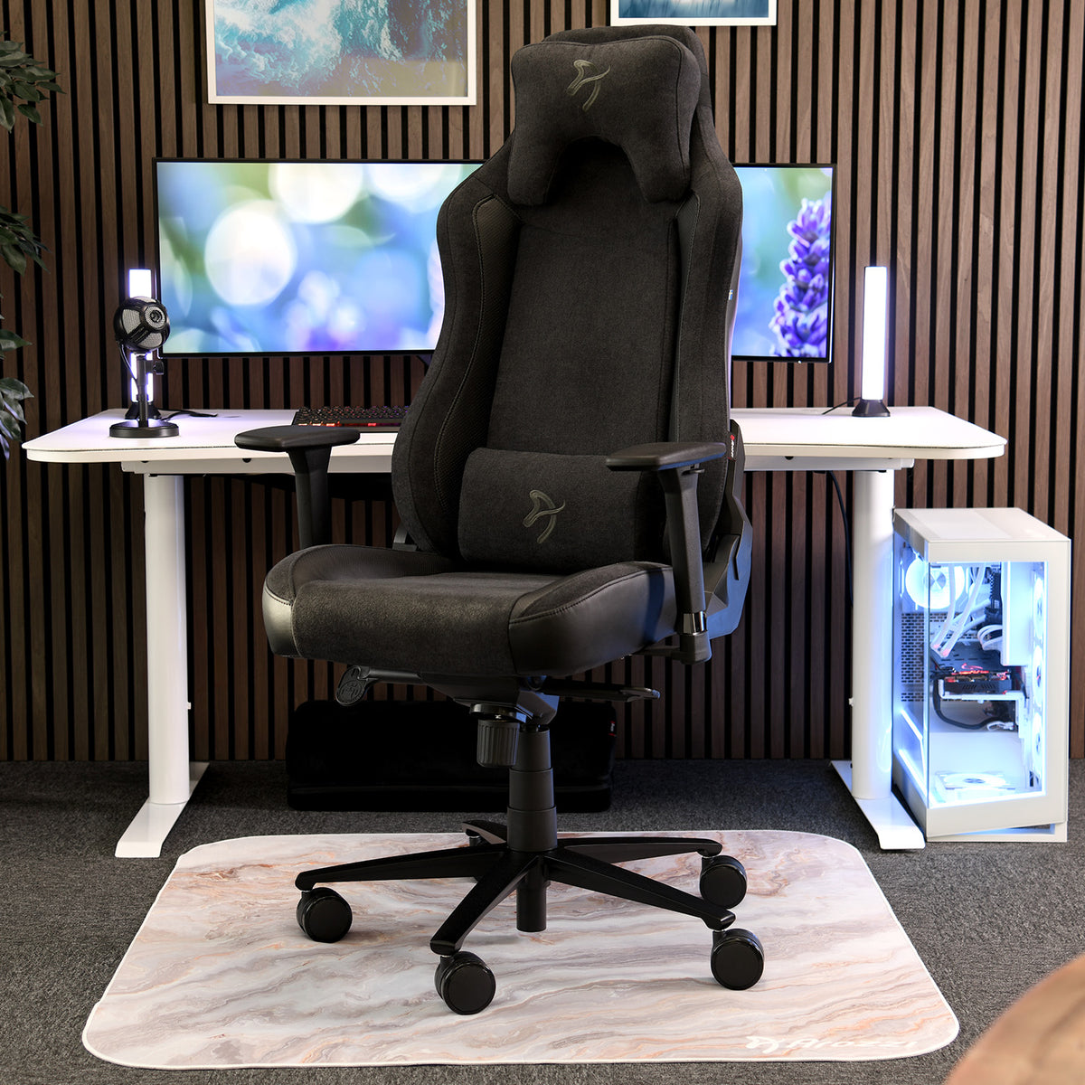 Arozzi Vernazza Vento black chair pairs with a modern LED gaming setup.