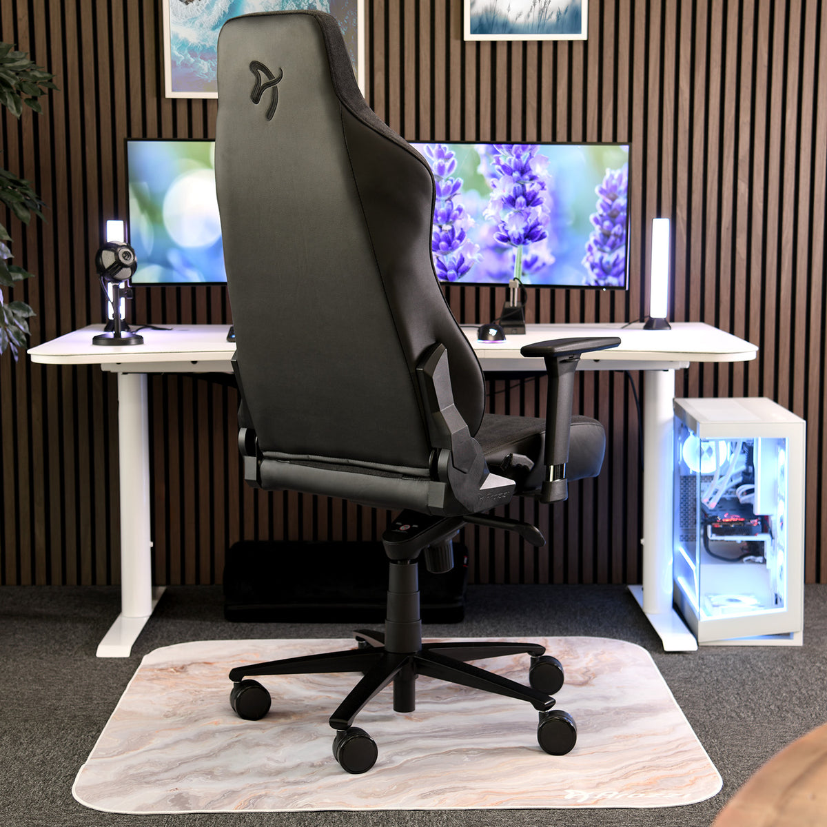 Arozzi Europe Vernazza Vento: black breathable gaming chair with durable upholstery at a desk.