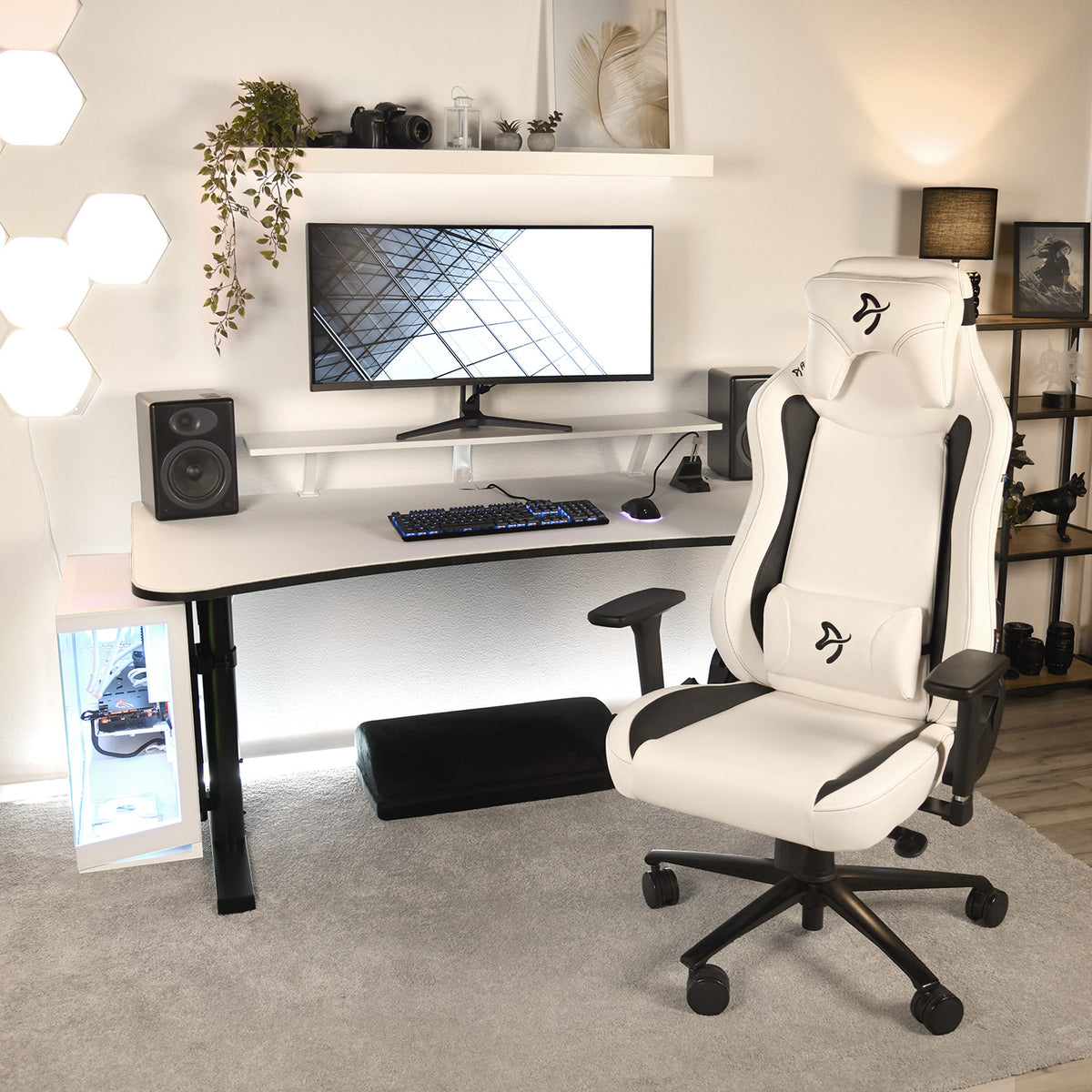 Arozzi Europe Vernazza SoftPU chair in a sleek desk setup with monitor, speakers, and decor.