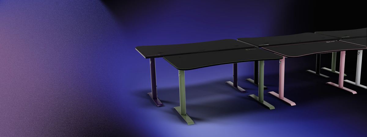 Three standing desks with colored legs on a gradient blue and purple background.