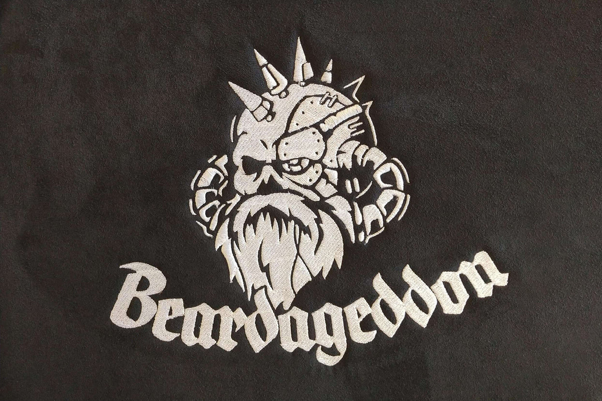 White skull with spikes and beard, with the word Beardageddon below on black background.